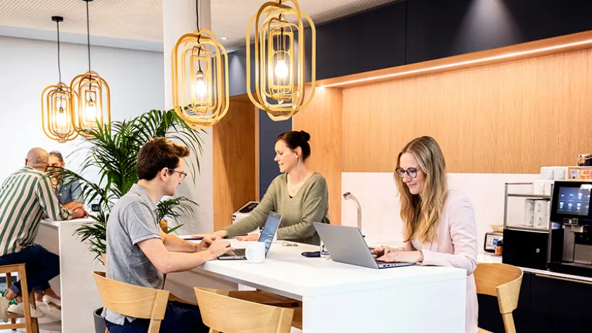 Employees sitting in barista bar